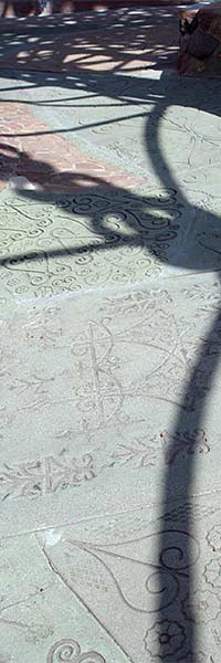 The towers and their supporting structures cast revealing shadows.